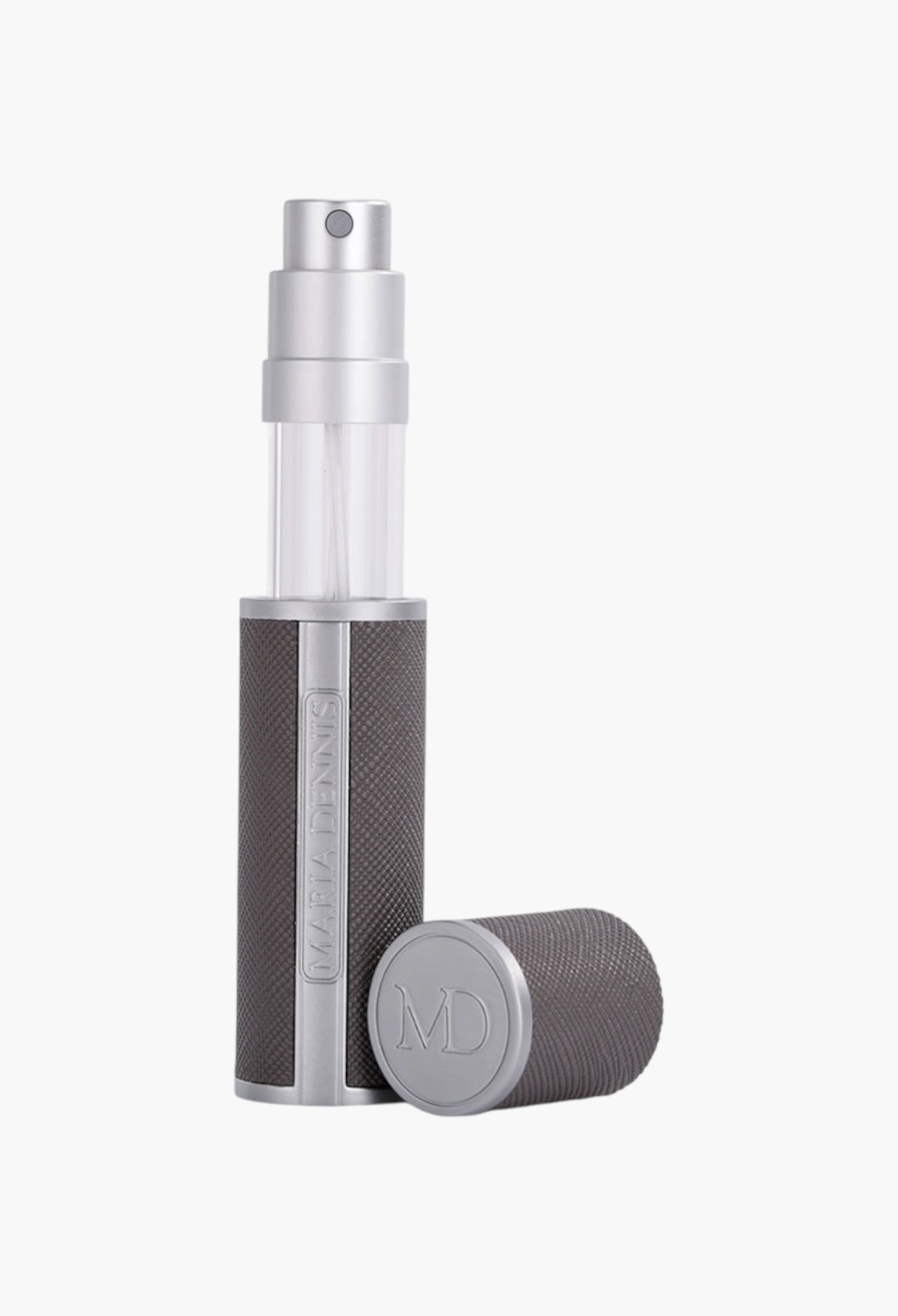 GLAM MODA Maria Dennis refillable perfume atomizer in grey with a textured grip and silver spray nozzle.