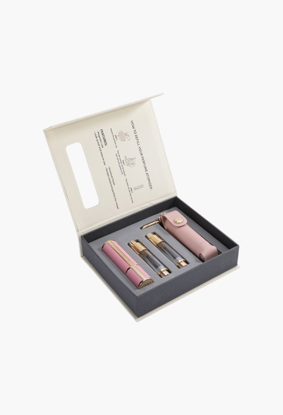 GLAM MODA refillable perfume atomizer set in dusty pink with travel case, glass vials, and instructional gift box.