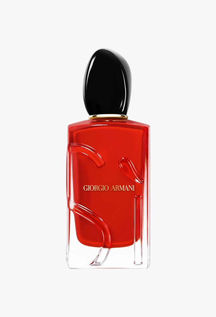 GLAM MODA Armani Beauty Sì Passione Eau de Parfum in a vibrant red glass bottle with a black cap