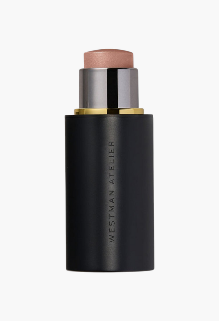 GLAM MODA Lit Up Highlight Stick in a sleek black twist-up tube for a radiant, glassy finish on skin.