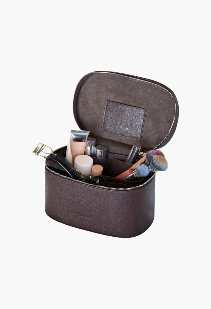 GLAM MODA brown vegan leather beauty case with removable organizer filled with makeup brushes and cosmetics