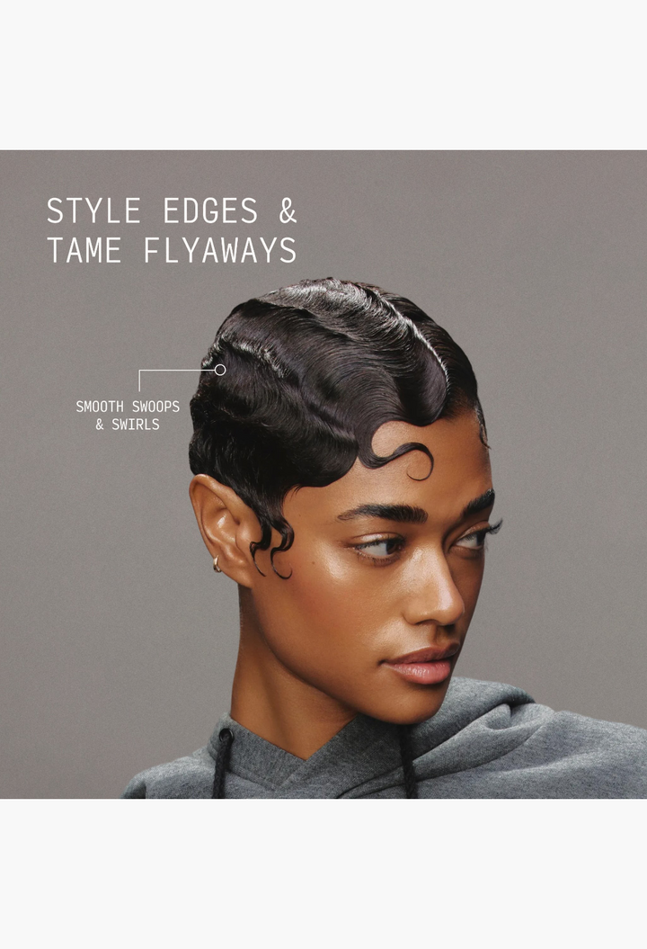 GLAM MODA Edge Brush used to style sleek, sculpted finger waves on a model with short dark hair