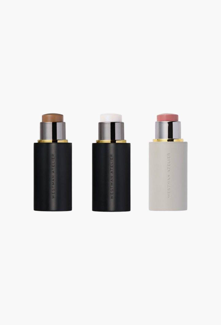 GLAM MODA The Clean Glow Trio featuring Westman Atelier contour, highlighter, and blush sticks in sleek packaging.