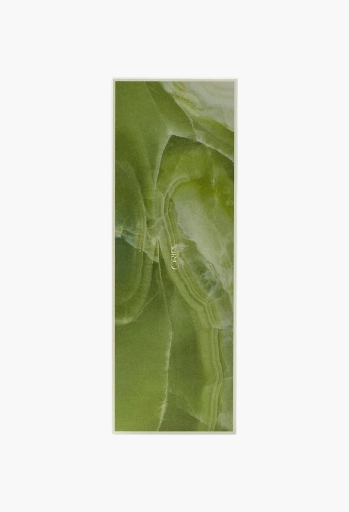 GLAM MODA Desertland incense box featuring a green marbled pattern with Oribe branding on a neutral background