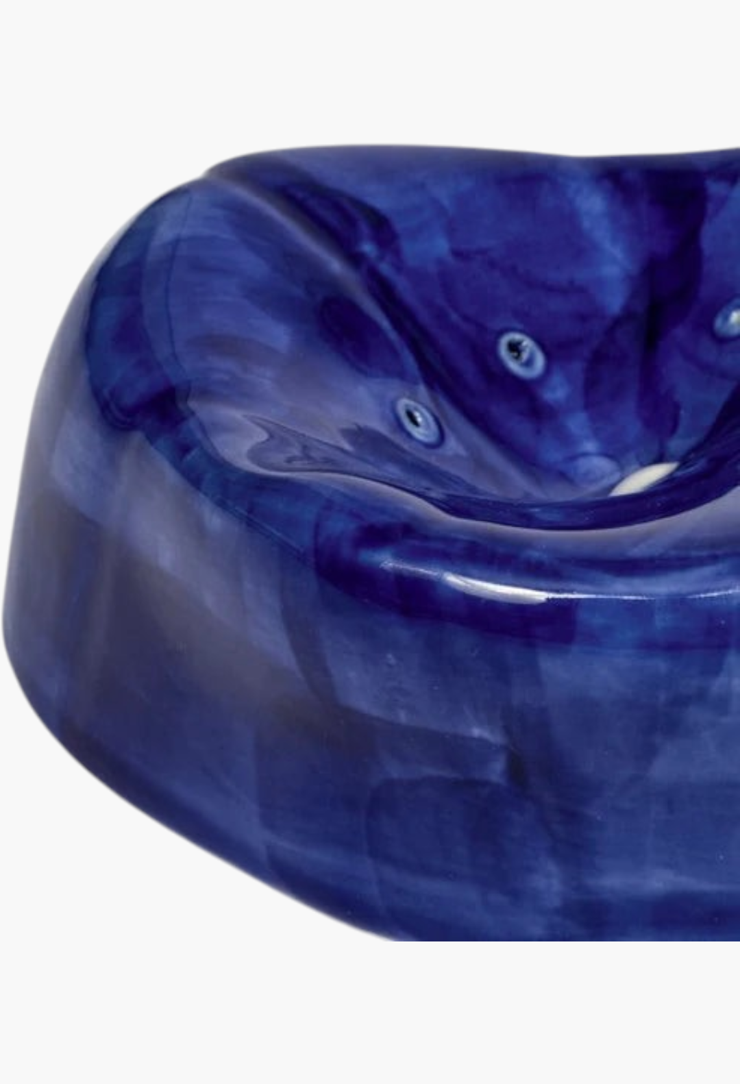 GLAM MODA handmade blue ceramic tray incense holder with a glossy finish and organic, wavy design.