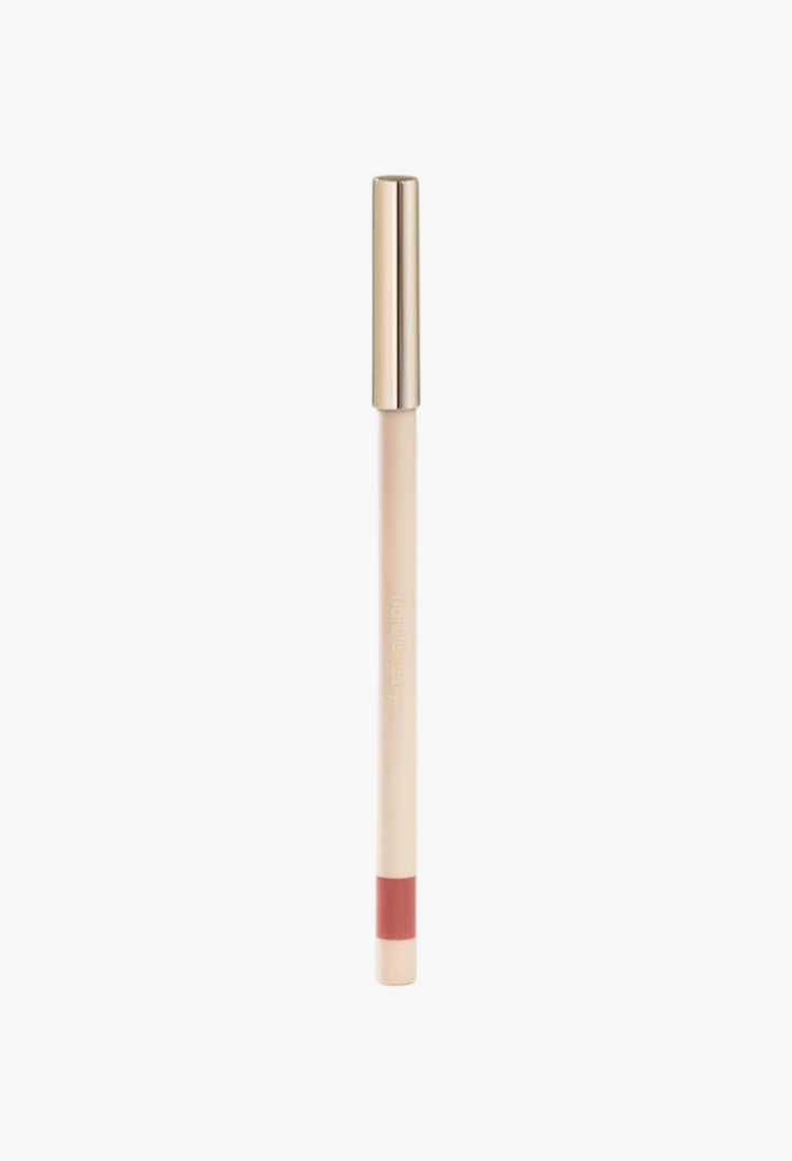 GLAM MODA Kind Words matte lip liner in a neutral rose shade with a gold cap standing upright on a light surface.