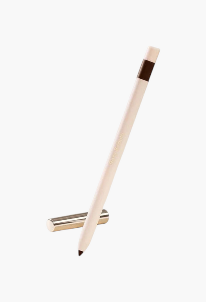 GLAM MODA Kind Words matte lip liner in a deep brown shade with a sleek cream-colored pencil body and gold cap.