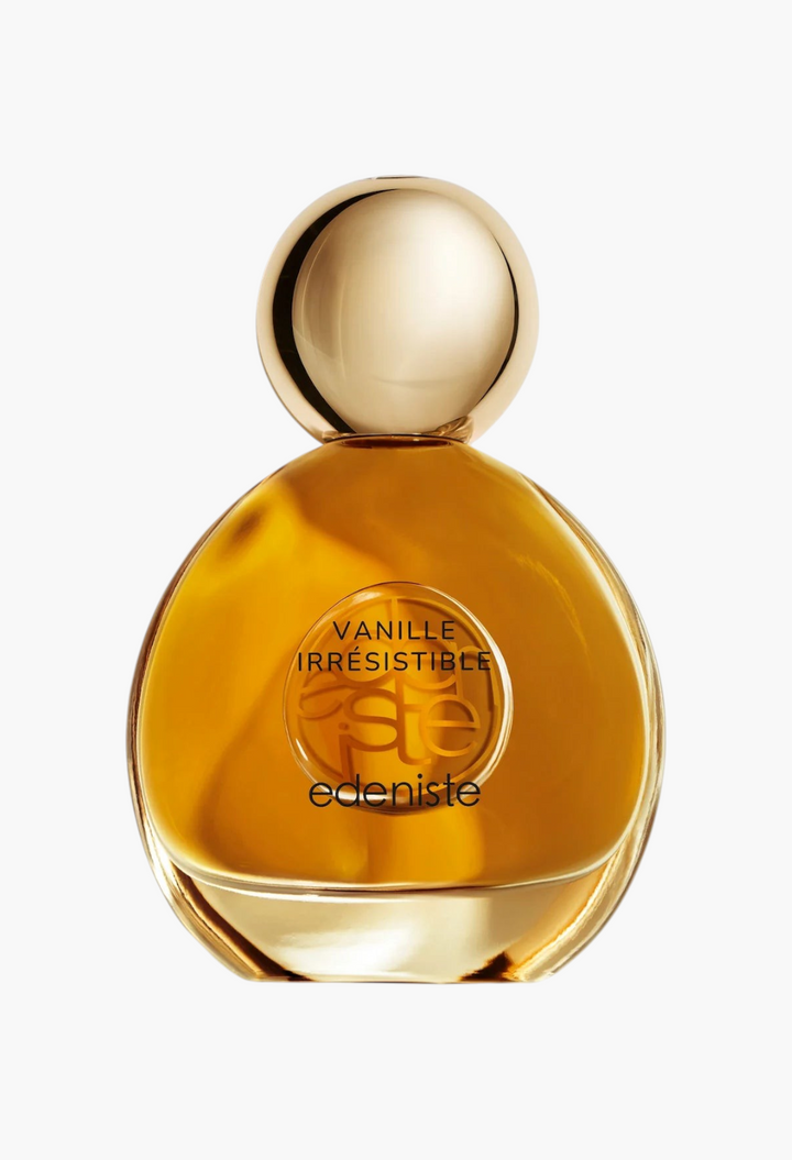 GLAM MODA Vanille Irresistible perfume bottle with amber liquid and a gold spherical cap on a white background