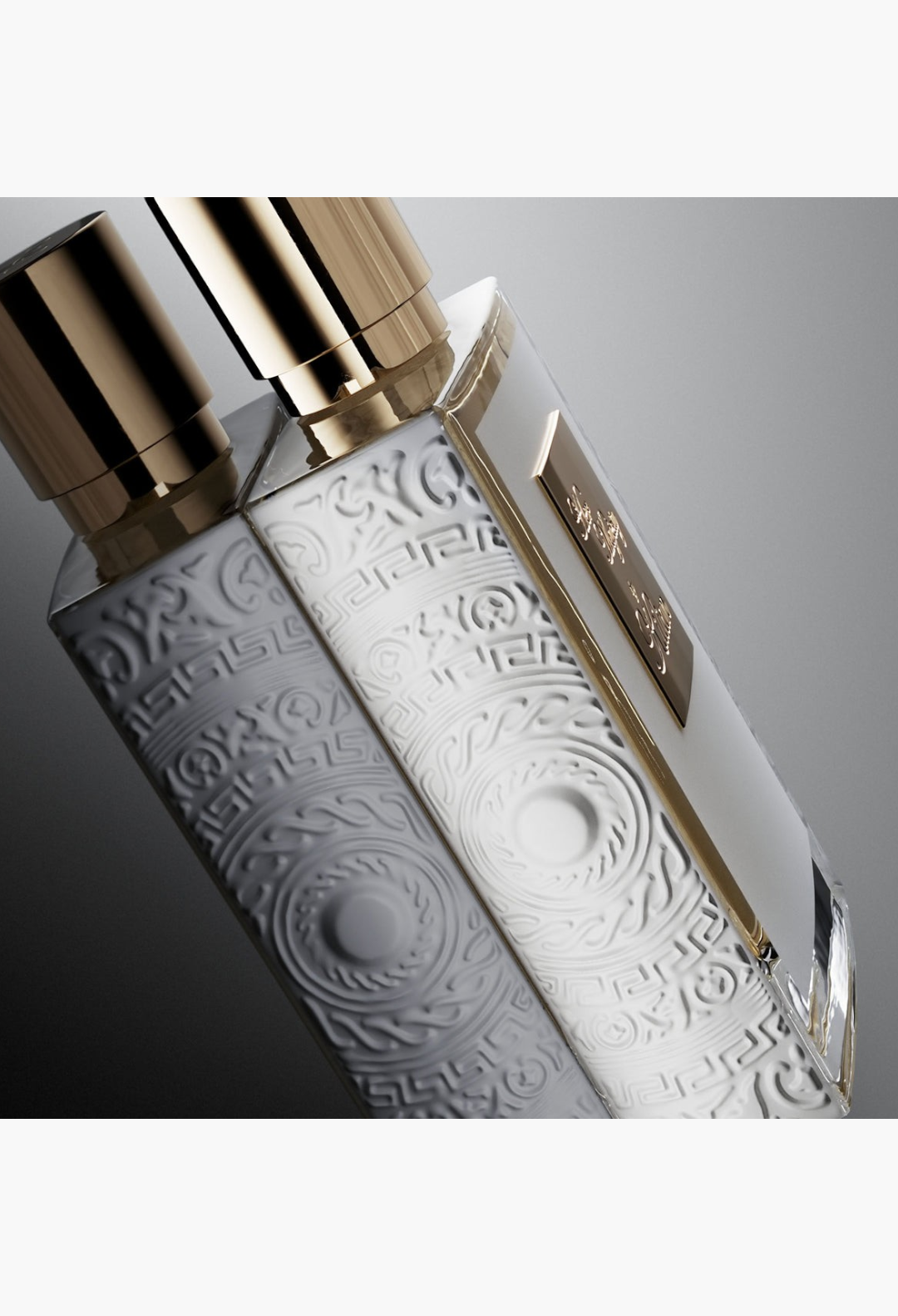 GLAM MODA Her Majesty Eau de Parfum bottle with intricate embossed patterns, gold cap, and elegant glass design.