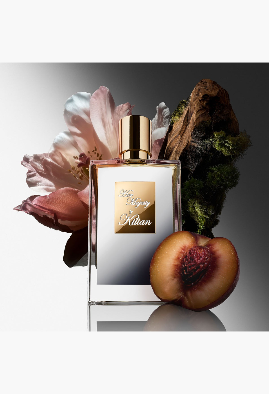 GLAM MODA Her Majesty Eau de Parfum bottle with Damascena rose, peach, and woody accents on a white background.