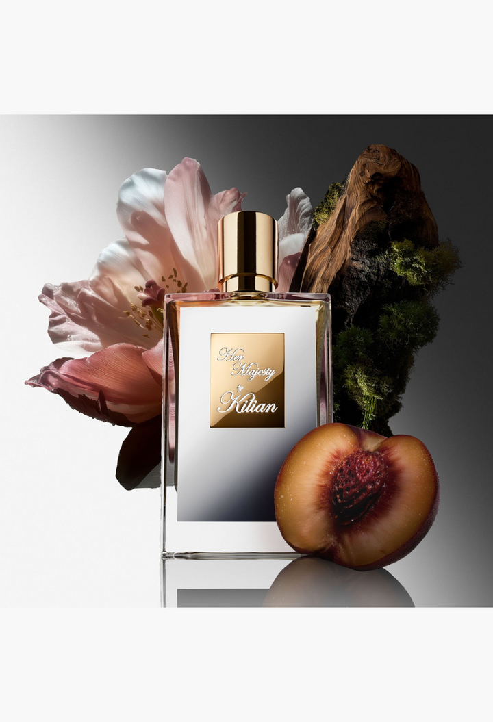 GLAM MODA Her Majesty Eau de Parfum bottle with Damascena rose, peach, and woody accents on a white background.