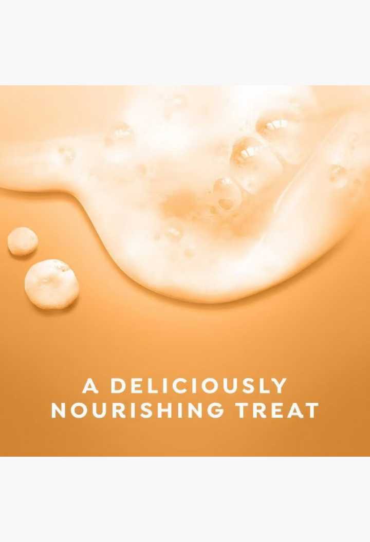 GLAM MODA Dove Cinnamon Pumpkin Pie body wash texture with creamy orange lather and nourishing moisture beads