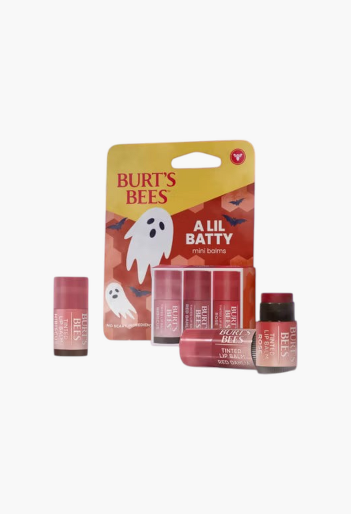 GLAM MODA Burt's Bees A Lil Batty Halloween tinted lip balm set featuring Hibiscus, Red Dahlia, and Rose shades.