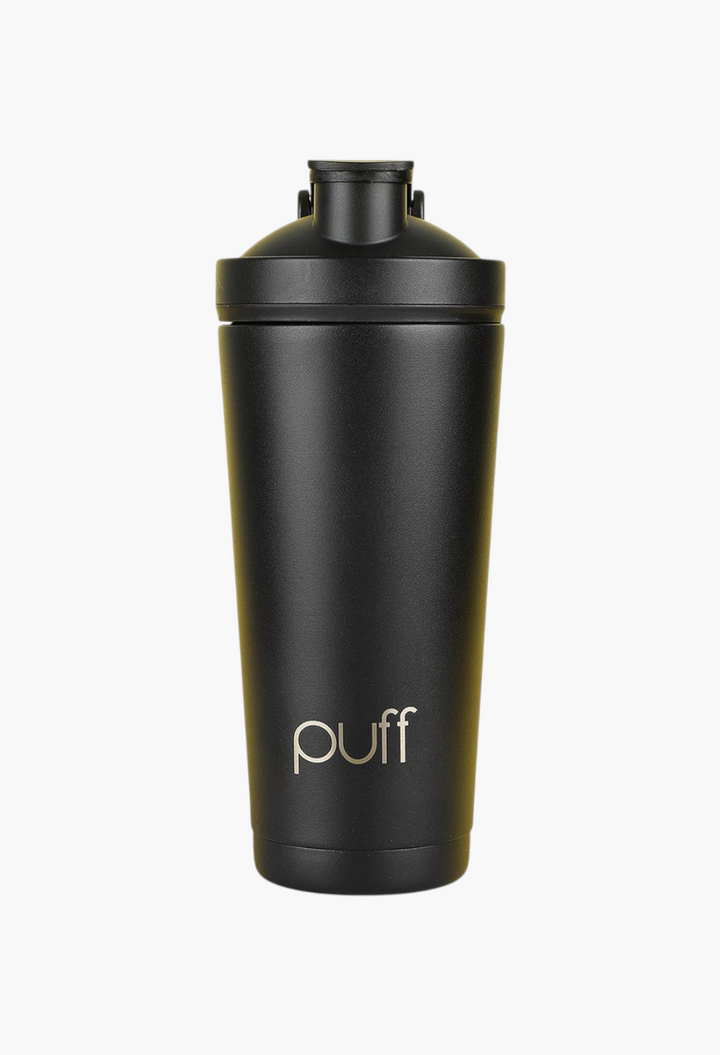 GLAM MODA matte black stainless steel Puff Shaker bottle with vacuum-insulated double-walled design on yellow background