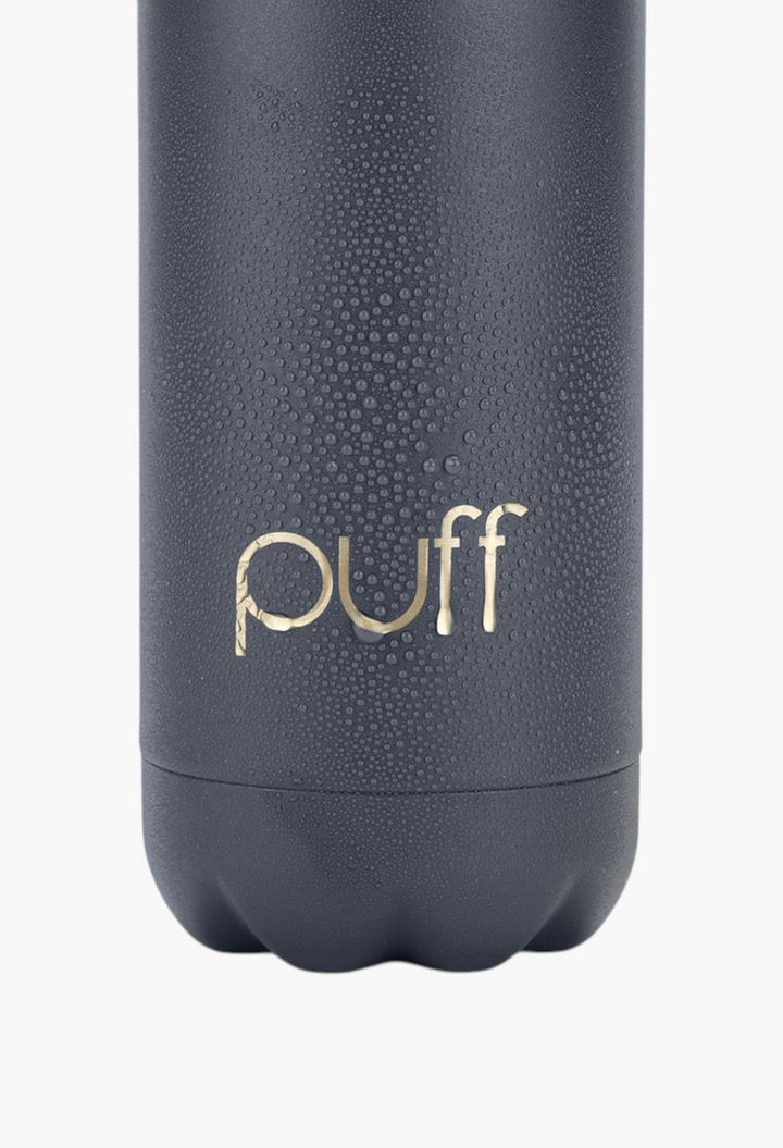 GLAM MODA matte Mykonos blue stainless steel Puff bottle with condensation droplets on the exterior surface