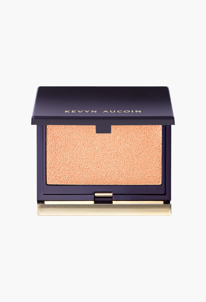 GLAM MODA Kevyn Aucoin Sensual Skin Highlighter in Supernova, a creamy peach-toned compact for a glassy glow.