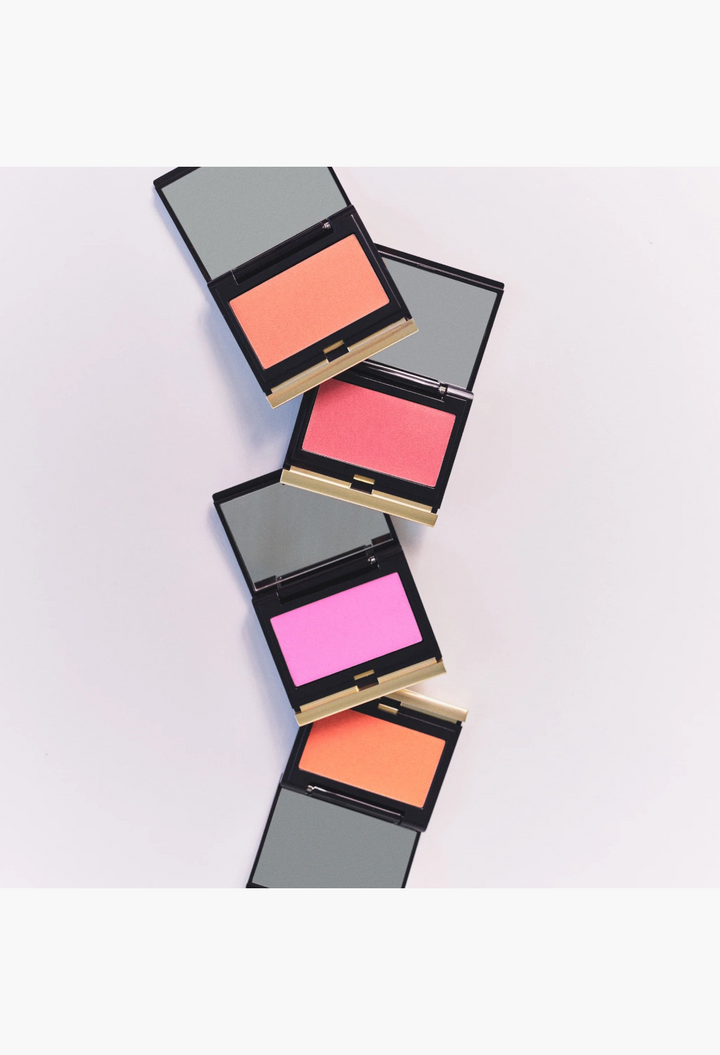 GLAM MODA Sensual Skin Blush collection featuring four cream-to-powder shades in sleek compacts with built-in mirrors.