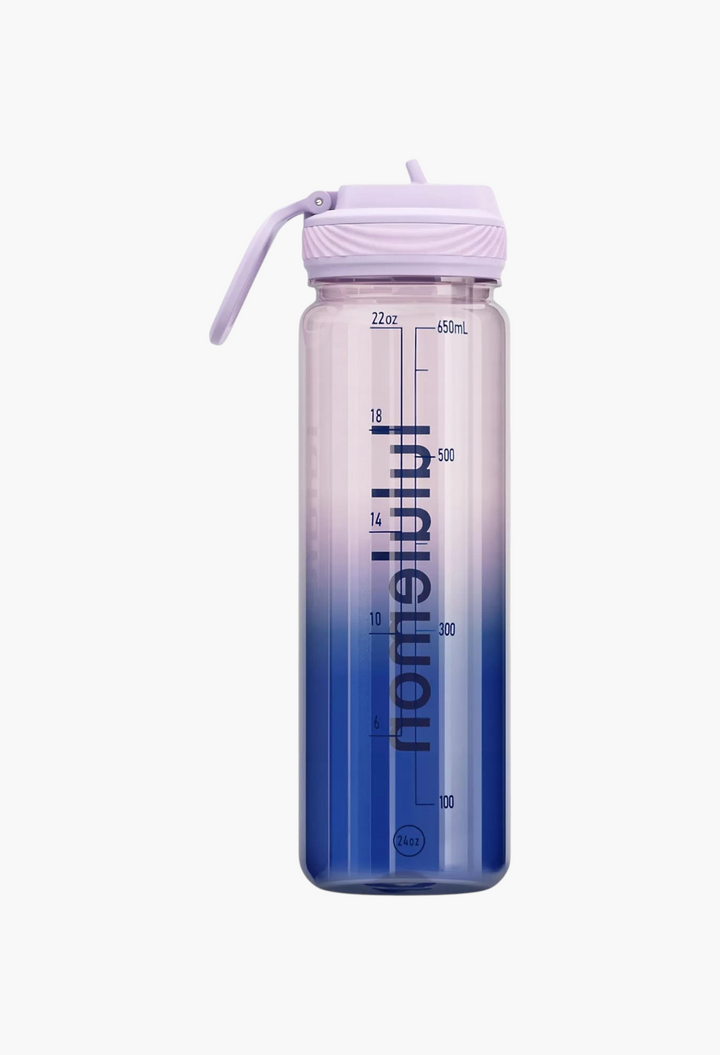 GLAM MODA Back to Life clear water bottle with a purple straw lid and blue-to-purple gradient finish with volume markers.