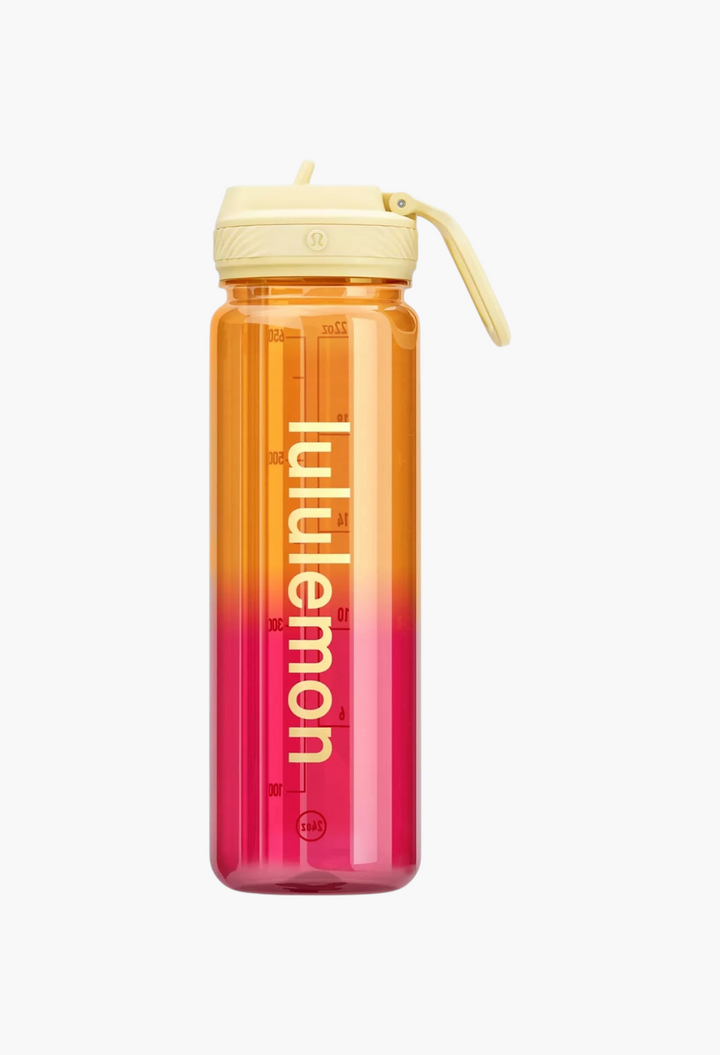 GLAM MODA Back to Life clear Tritan water bottle with a yellow straw lid and orange to pink gradient design.