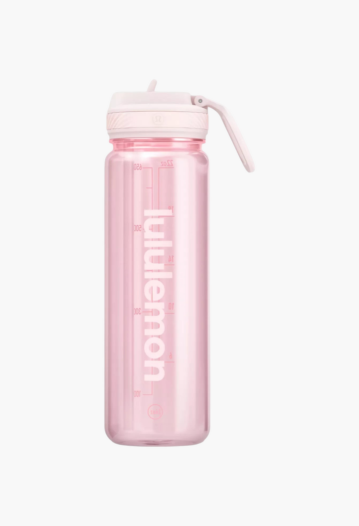 GLAM MODA 24oz clear pink water bottle with a leakproof straw lid and measurement markings for hydration tracking.