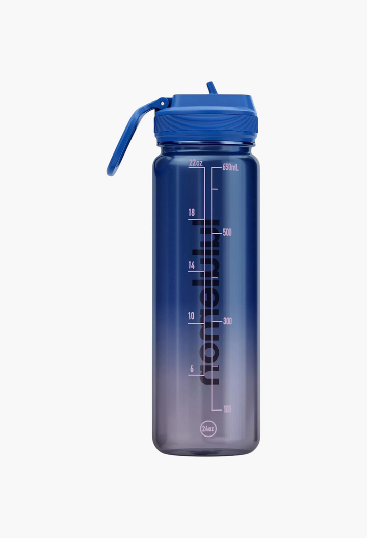 GLAM MODA 24oz clear blue gradient water bottle with a leakproof straw lid and hydration measurement markings.