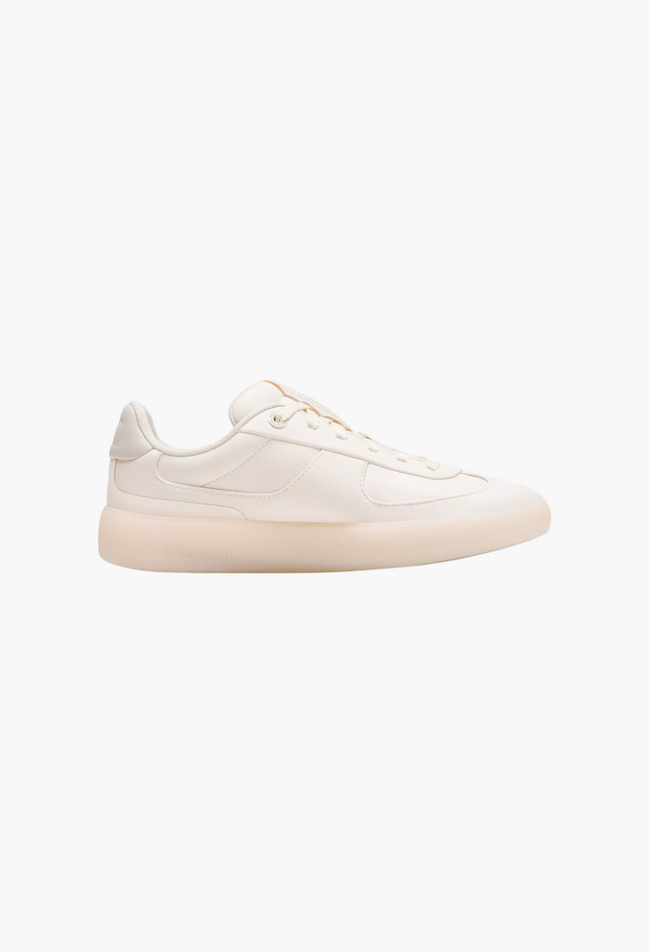 GLAM MODA Women's Cityverse sneaker in off-white leather-alternative with a thick rubber outsole and sleek design.