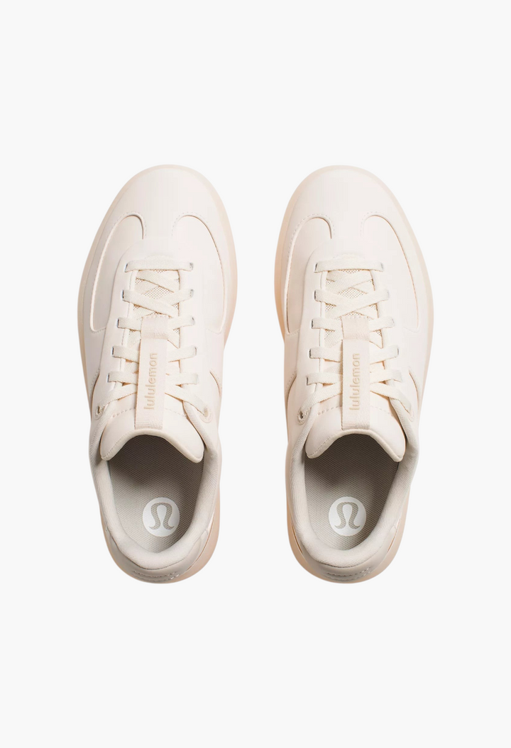 GLAM MODA Women's Cityverse sneaker in light pink with leather-alternative upper and rubber outsole, top view.