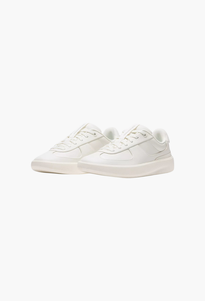 GLAM MODA Women's Cityverse white leather-alternative sneakers with exposed stitching and a cupped rubber outsole.