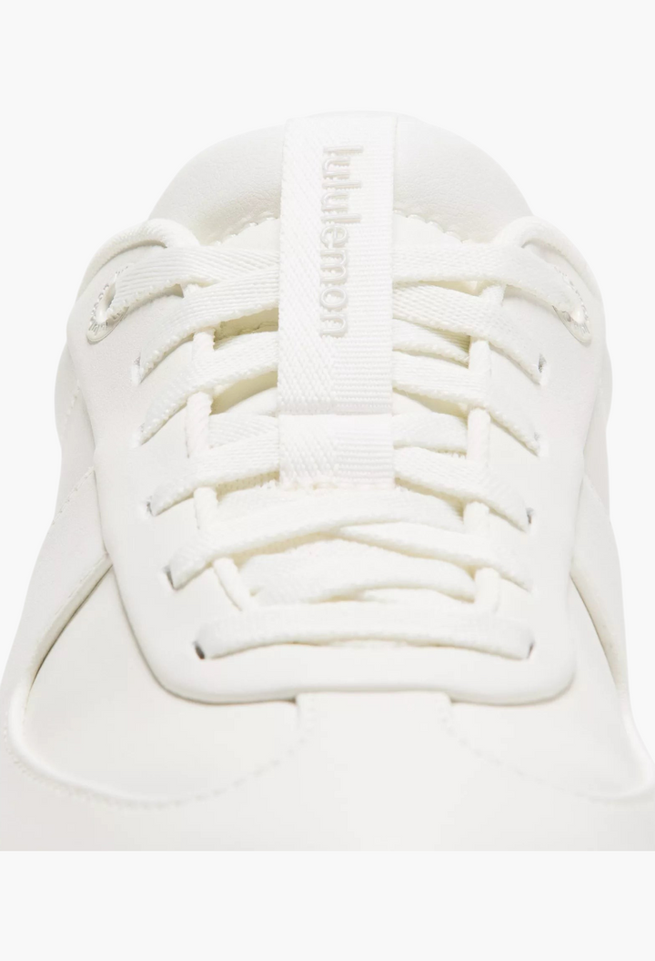 GLAM MODA Women's Cityverse sneaker in white with a clean leather-alternative upper and matching laces.
