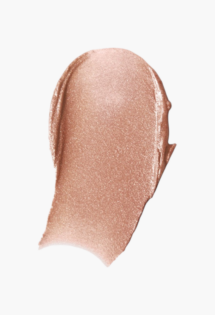 GLAM MODA Lit Up Highlight Stick translucent gel highlighter swatch with a radiant, light-catching glassy finish.