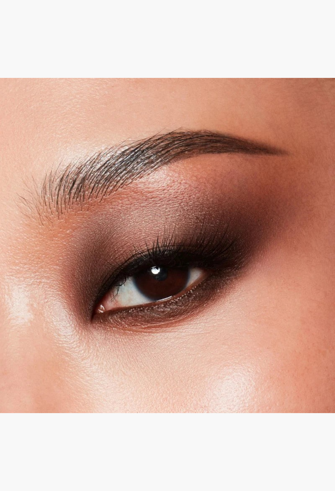 GLAM MODA Major Dimension III eyeshadow palette applied as a soft, blended matte nude smoky eye look on a model