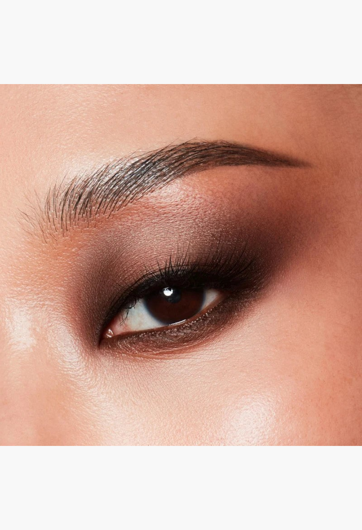 GLAM MODA Major Dimension III eyeshadow palette applied as a soft, blended matte nude smoky eye look on a model