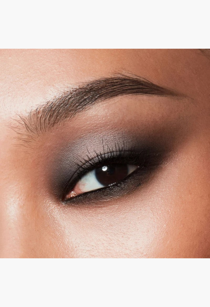 GLAM MODA Major Dimension III matte eyeshadow in smoky cool and warm nude tones applied on a model eyelid