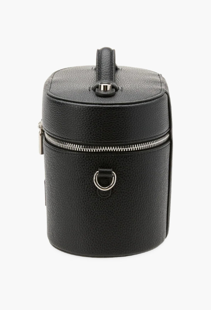 GLAM MODA black oval vegan leather toiletry case with a top handle, silver zipper, and shoulder strap attachment ring.