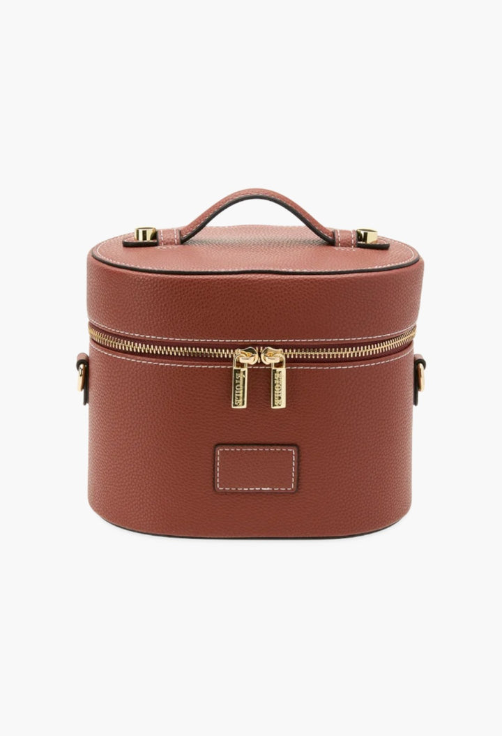 GLAM MODA oval toiletry case in brown vegan leather with gold dual zippers, top handle, and detachable strap.