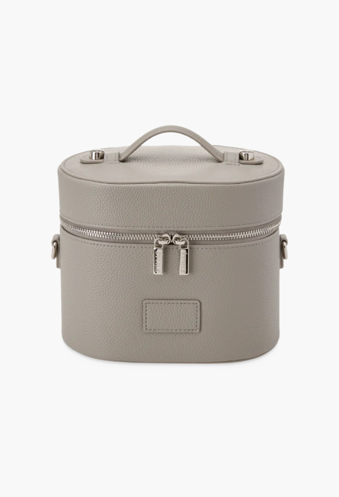 GLAM MODA oval toiletry case in grey vegan leather with a top handle, dual zippers, and a structured design.