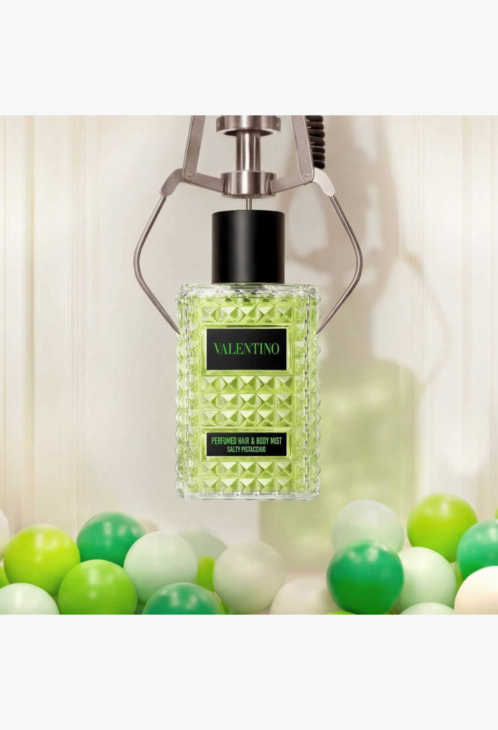 GLAM MODA Valentino Born in Roma Salty Pistachio hair and body mist in a green studded glass bottle with spheres