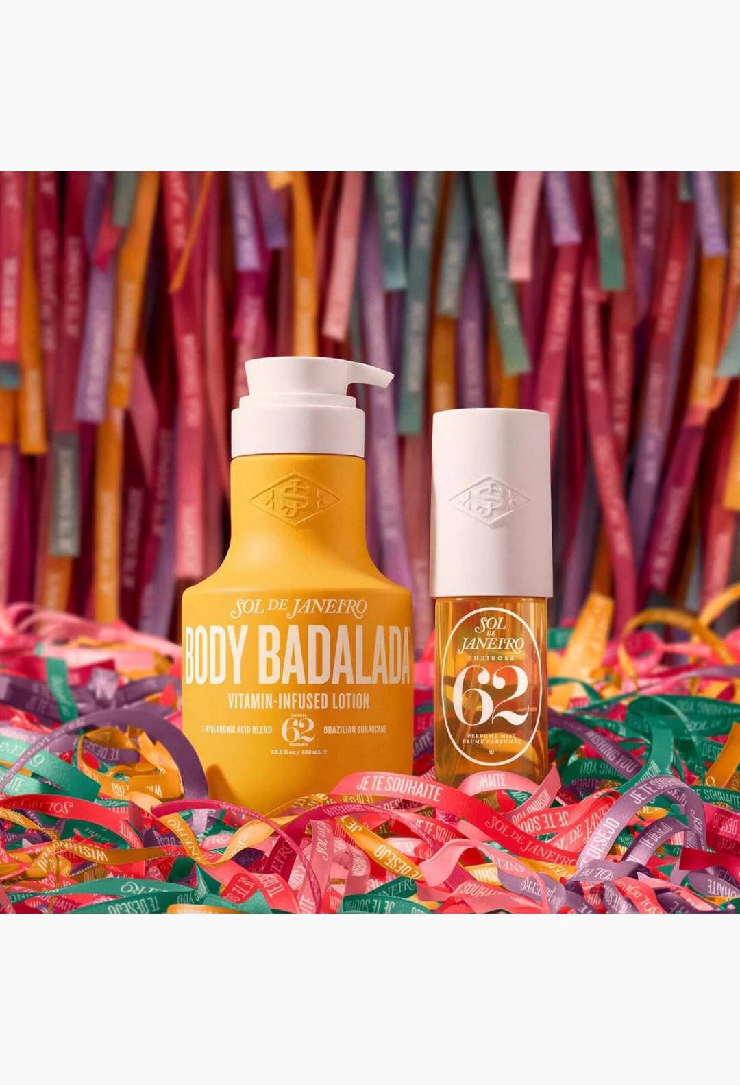 GLAM MODA Body & Sol duo featuring a yellow Body Badalada lotion bottle and Cheirosa 62 perfume mist on confetti.