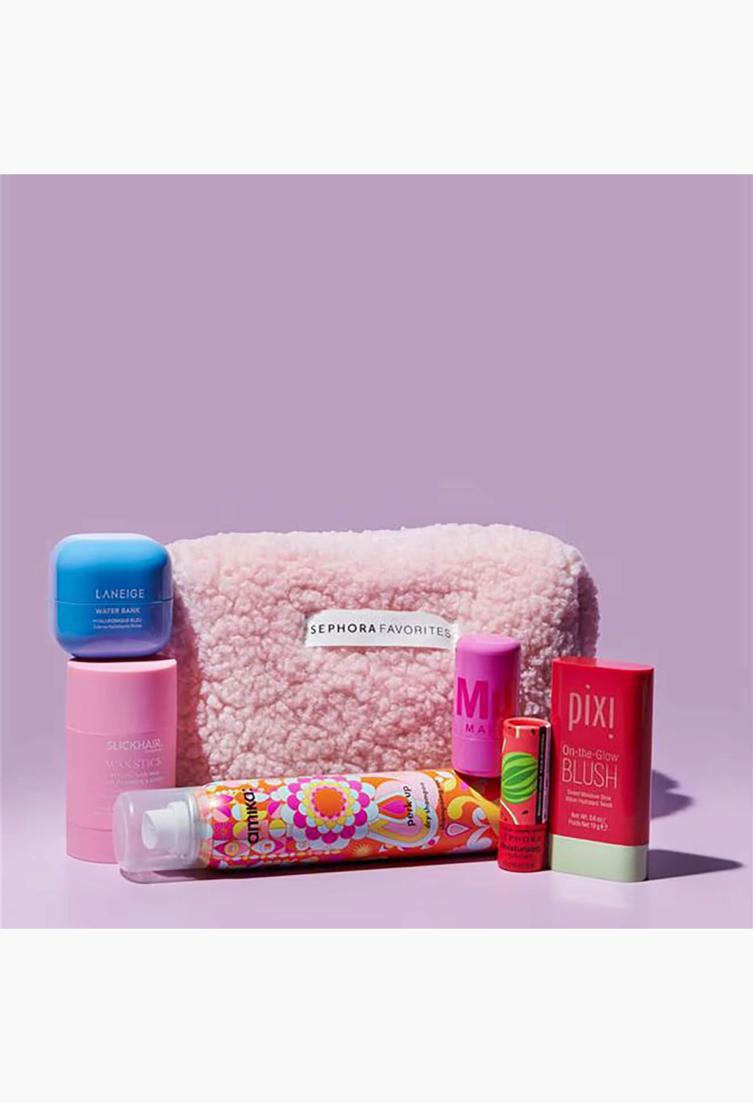 GLAM MODA Beauty Refresh set featuring skincare, makeup, and hair products with a pink fuzzy pouch on purple background