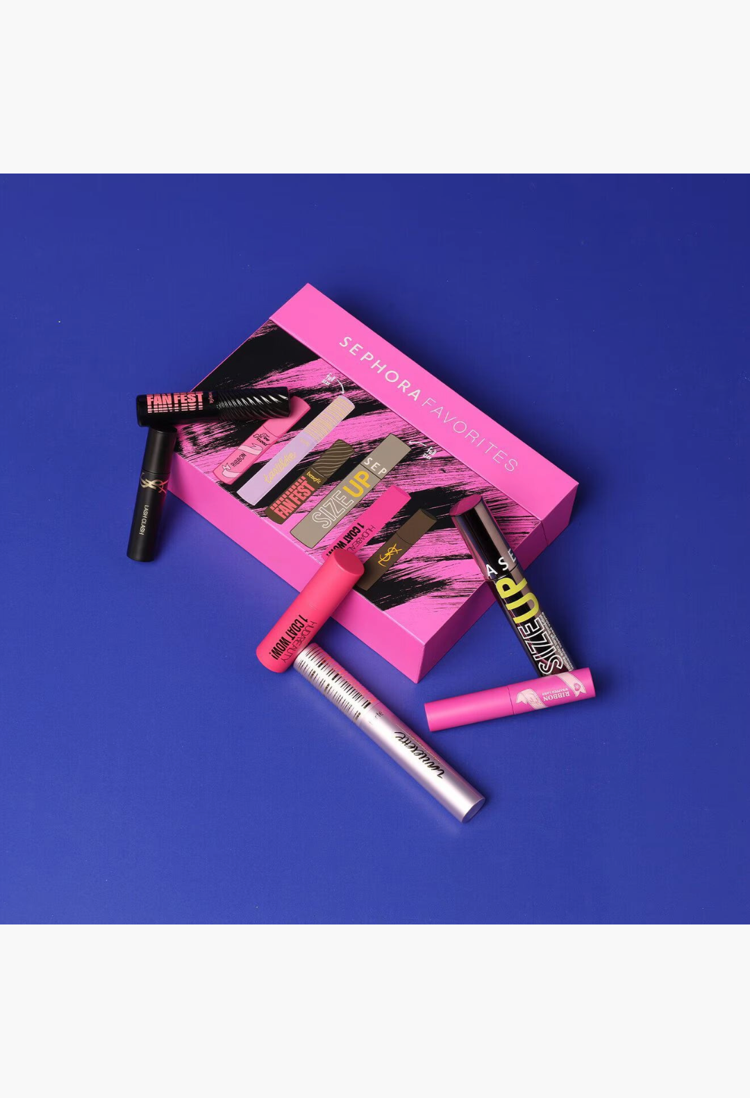 GLAM MODA Lash Drama set featuring six assorted luxury mascaras and a pink Sephora Favorites gift box on blue background