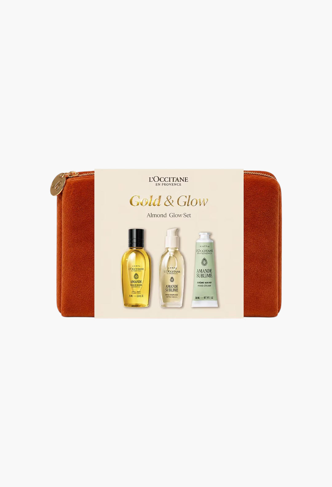 GLAM MODA Gold & Glow Almond skincare set featuring shower oil, body oil, and hand cream in a rust velvet pouch.