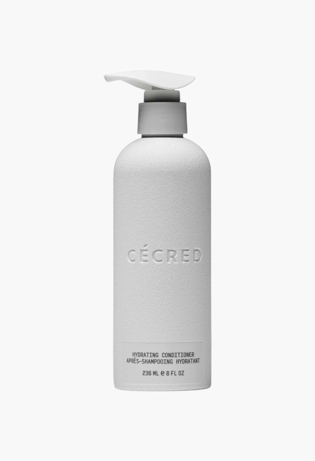 GLAM MODA Cécred Hydrating Conditioner in a white pump bottle against a black background