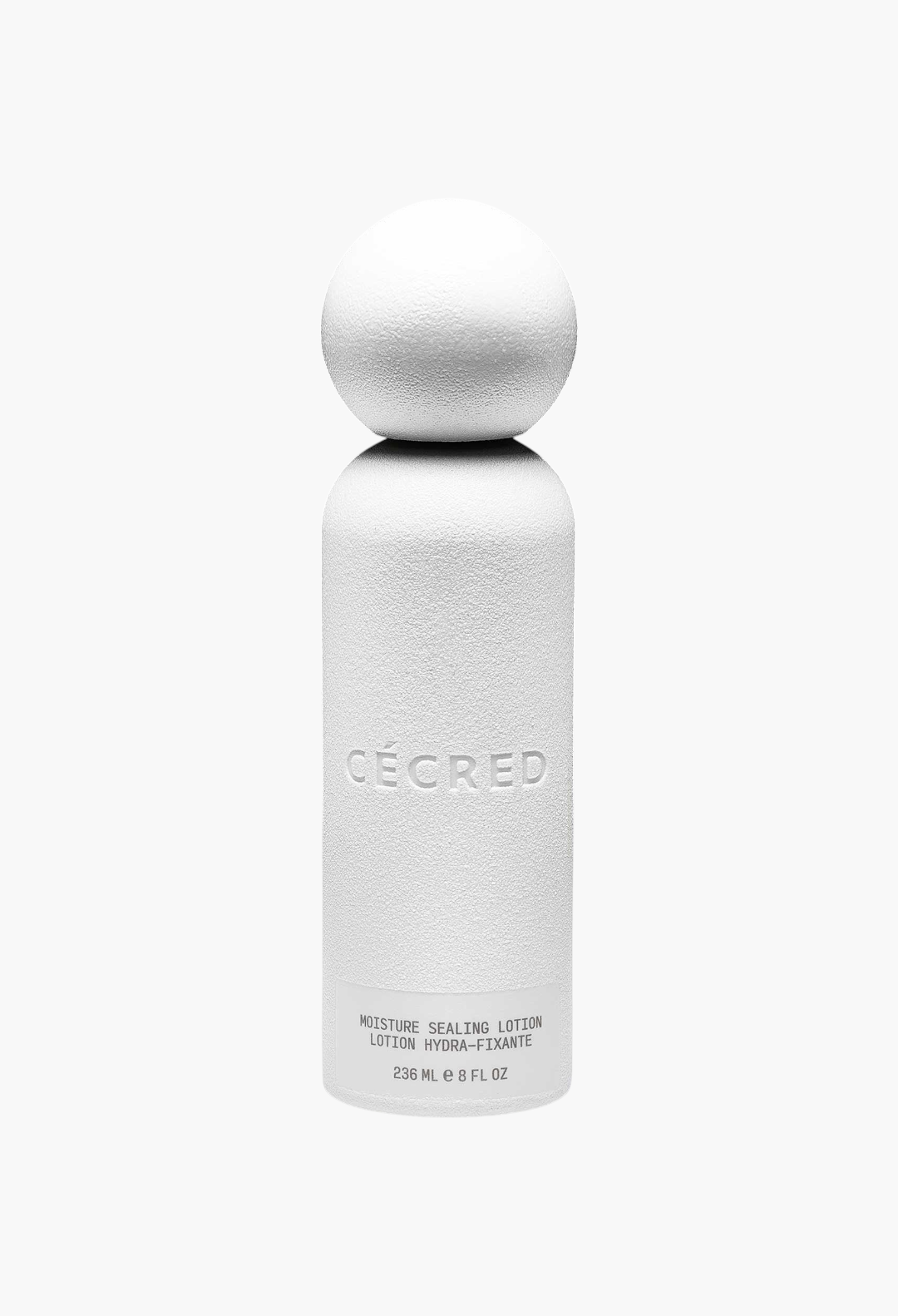 GLAM MODA Moisture Sealing Lotion in a white cylindrical bottle with a spherical cap against a black background.