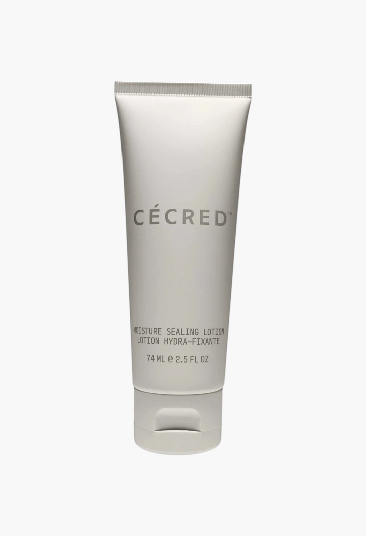 GLAM MODA CÉCRED Moisture Sealing Lotion in a white squeeze tube for frizz control and curl definition.