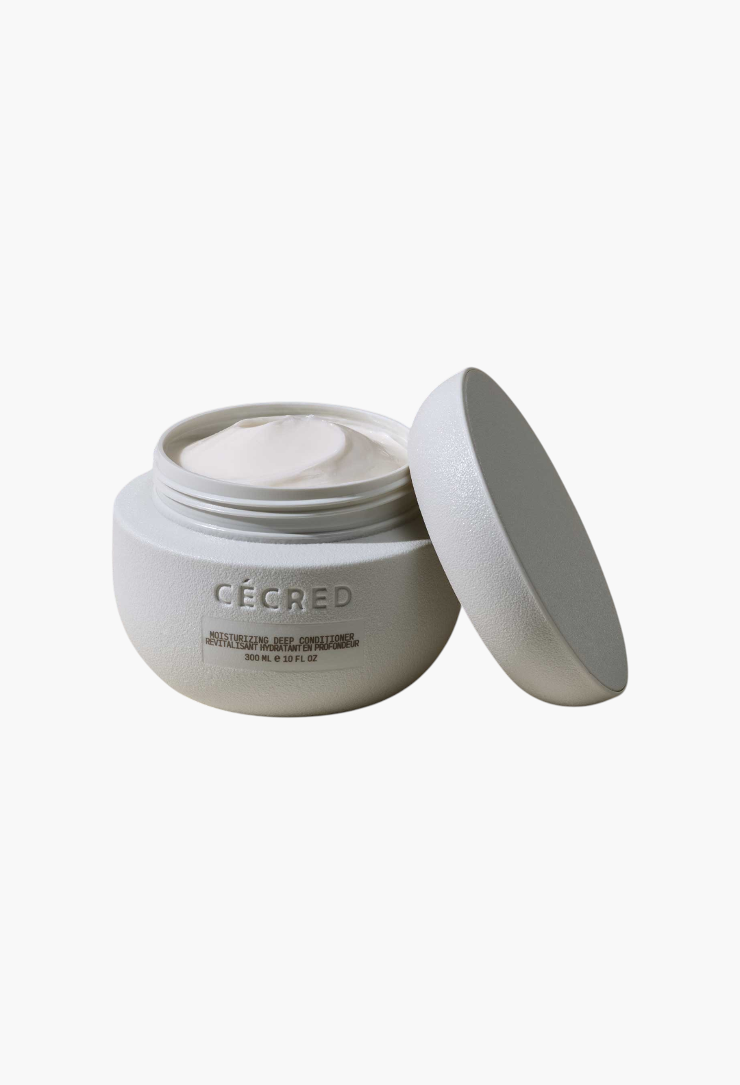 GLAM MODA Moisturizing Deep Conditioner in a white textured jar with a creamy hair treatment inside.