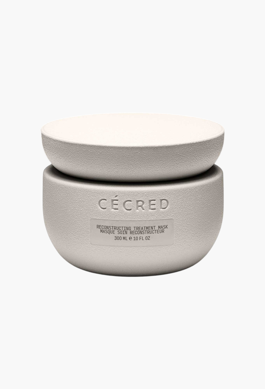 GLAM MODA Cécred Reconstructing Treatment Mask in a textured beige jar for hair repair and strengthening.