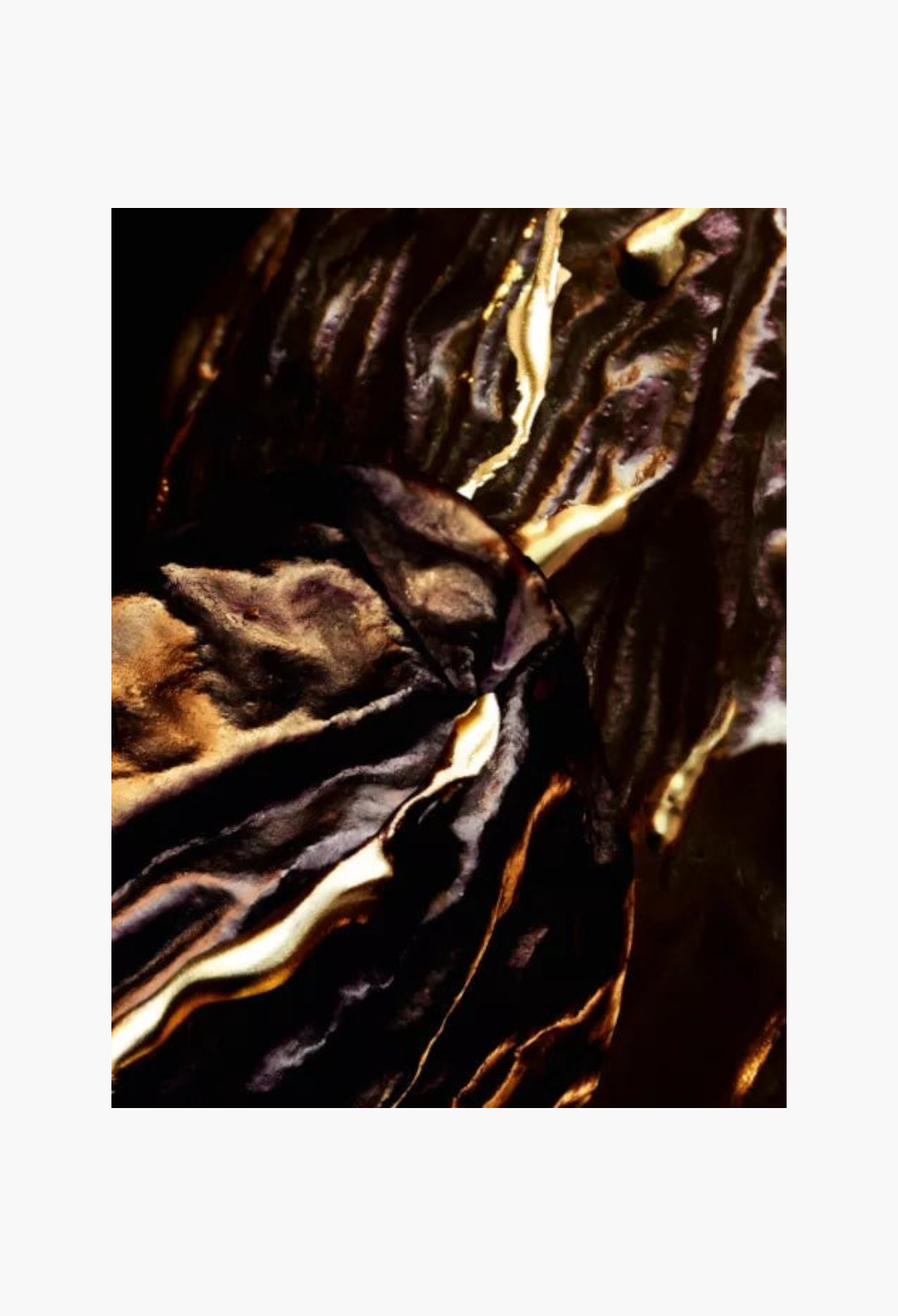 GLAM MODA Guerlain Tonka Sarrapia Extrait 75 parfum extract featuring dark textured tonka bean with gold accents