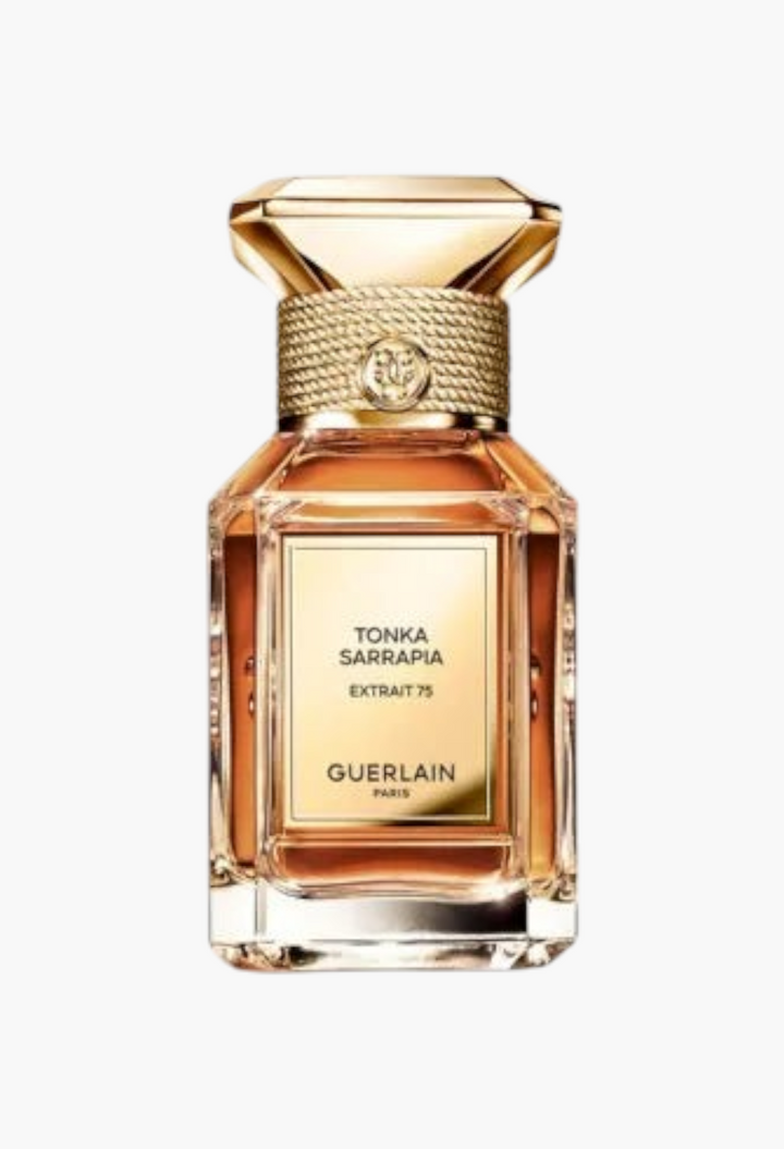 GLAM MODA Guerlain Tonka Sarrapia Extrait 75 perfume bottle with gold cap and amber liquid in a glass flacon