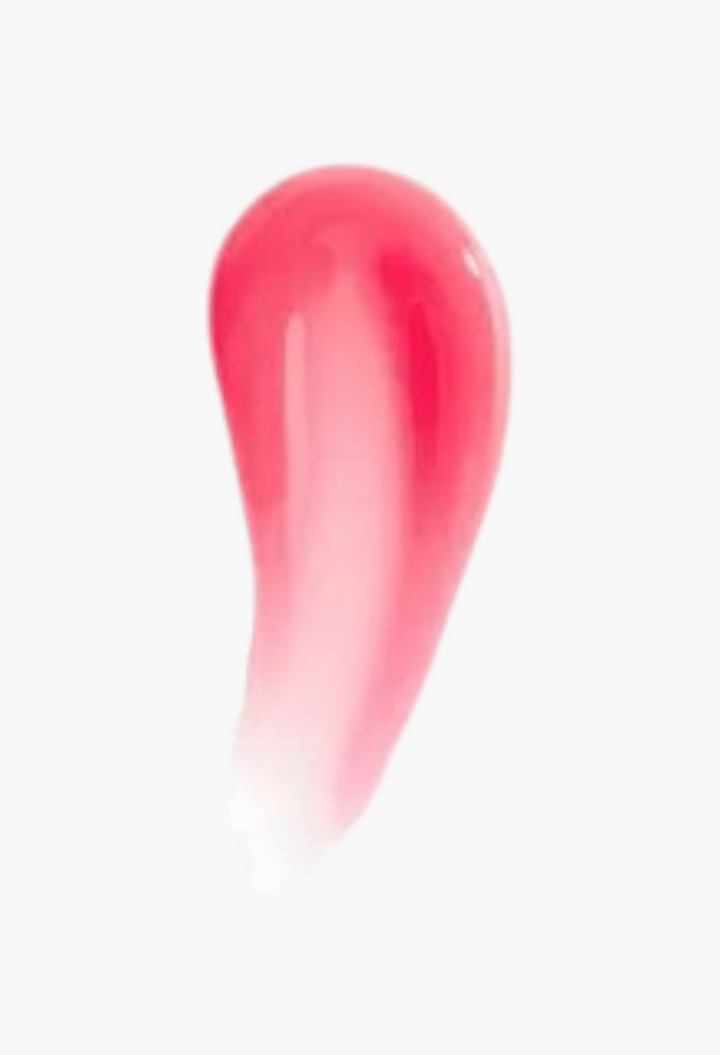 GLAM MODA Kylie by Kylie Jenner Gloss Drip lipgloss swatch showing a vibrant pink, high-shine liquid texture.