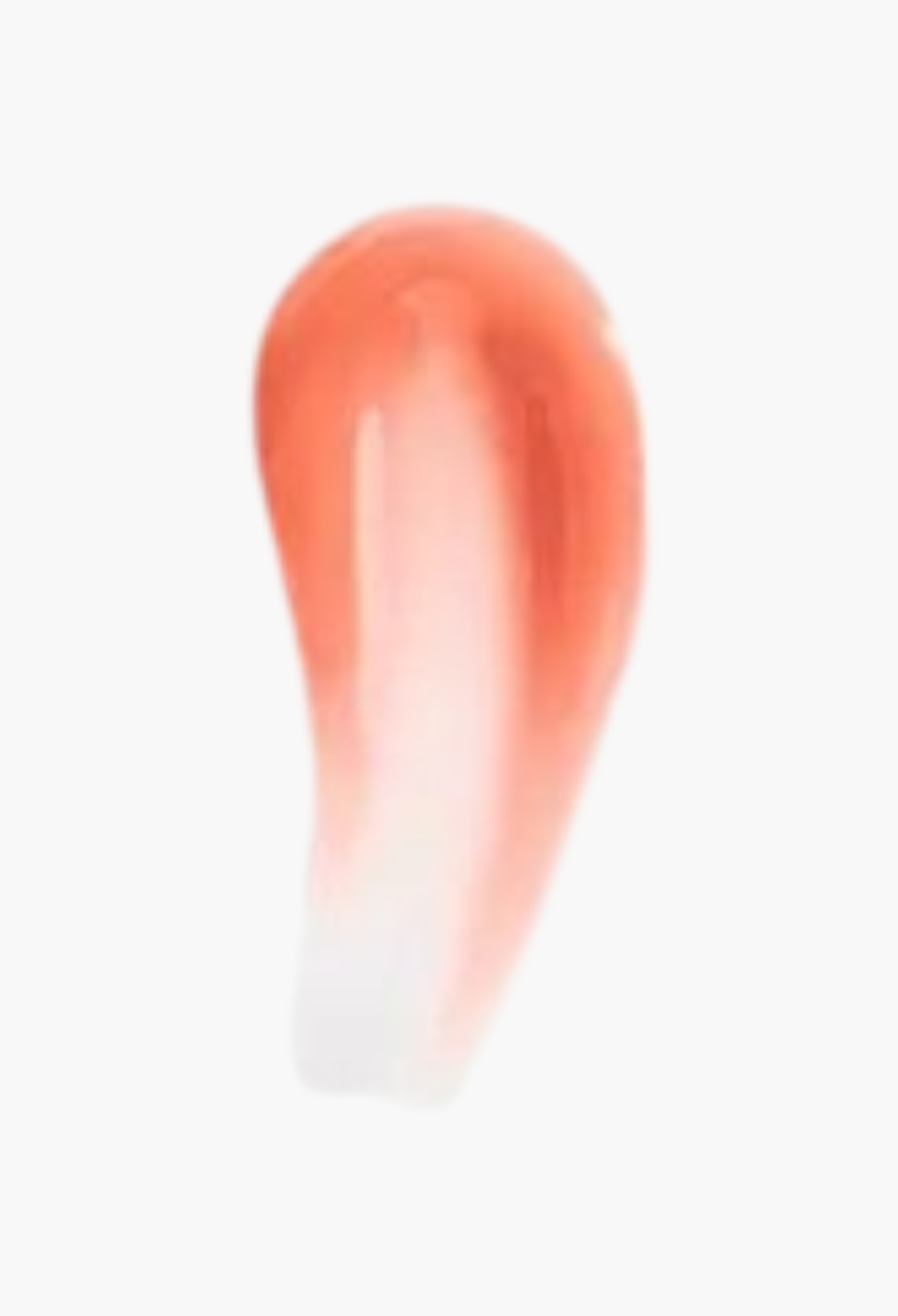 GLAM MODA Kylie by Kylie Jenner Gloss Drip lipgloss swatch showing a sheer coral pink mirror-shine texture